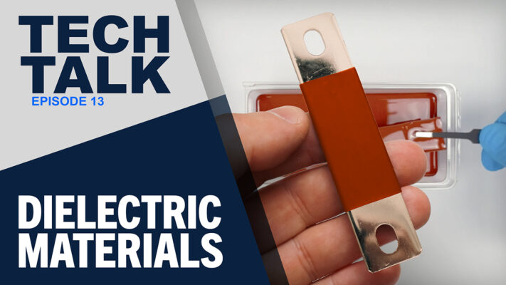 A promotional image for &ldquo;Tech Talk Episode 13&rdquo; titled &ldquo;Dielectric Materials.&rdquo; The left side features bold blue and white text on a gray and navy background. On the right, a hand holds a metal busbar partially coated in an red dielectric material, while another hand wearing a blue glove applies the coating in the background.