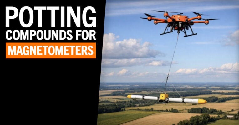 Banner image with the headline &ldquo;POTTING COMPOUNDS FOR MAGNETOMETERS&rdquo; on the left, and a drone flying over farmland on the right while carrying a long cylindrical sensor payload suspended by a cable under a blue sky.